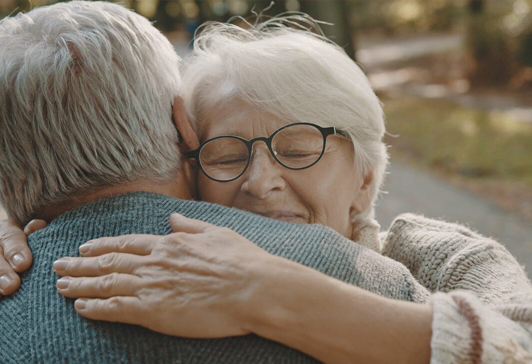 Comforting hug couple